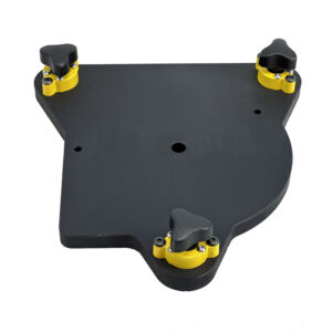 A black triangular mounting plate with three yellow and black magnetic locks, a center hole for mounting to a platform, and two holes for attaching a MicroScribe portable arm.